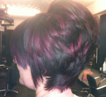 Short black hairstyle with pink highlights