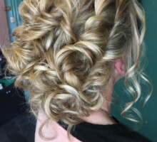 Curly blonde hair