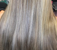 Long blonde highlighted straight hairstyle